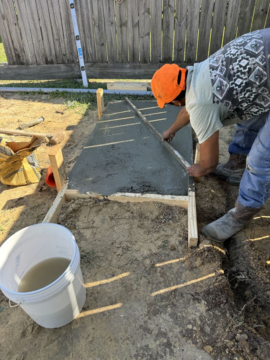Pouring a generator pad during a Generac installation